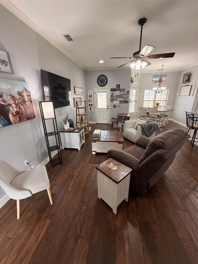 living room with dark wood finished floors, visible vents, recessed lighting, and crown molding