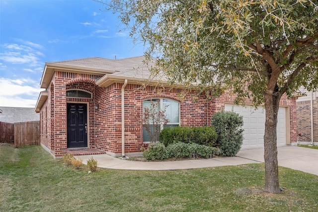 ranch-style house featuring a front yard, brick siding, driveway, and fence