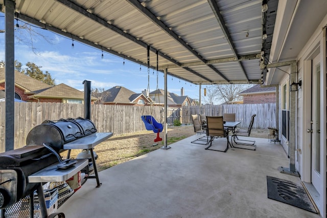 view of patio / terrace with a fenced backyard and outdoor dining space