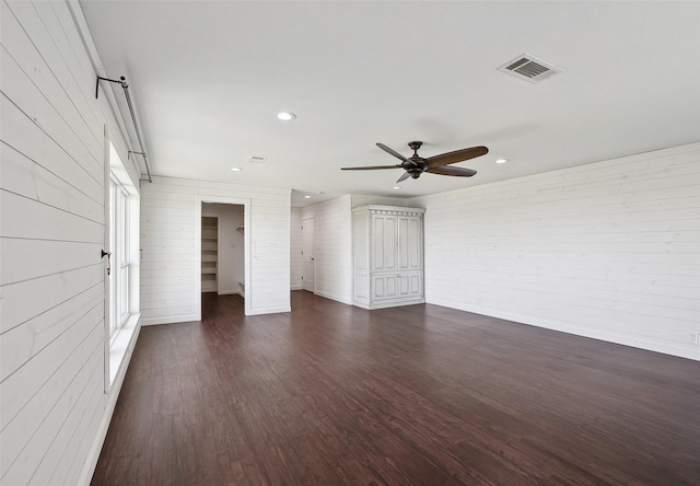 unfurnished living room featuring visible vents, recessed lighting, dark wood-type flooring, and ceiling fan