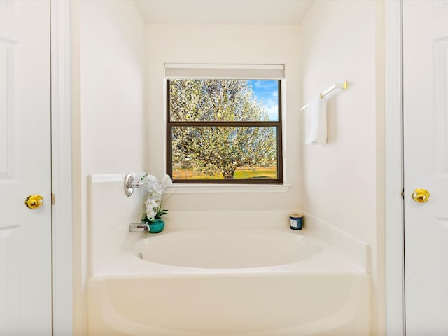 bathroom featuring a garden tub