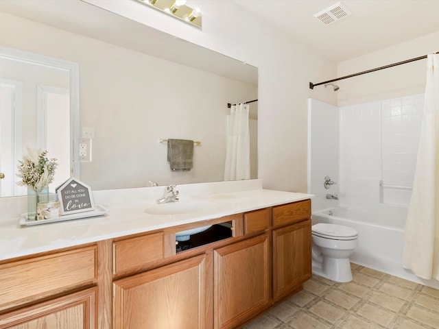 bathroom with tile patterned floors, visible vents, toilet, shower / tub combo, and vanity