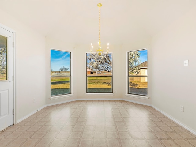 unfurnished dining area with baseboards, a notable chandelier, and light floors