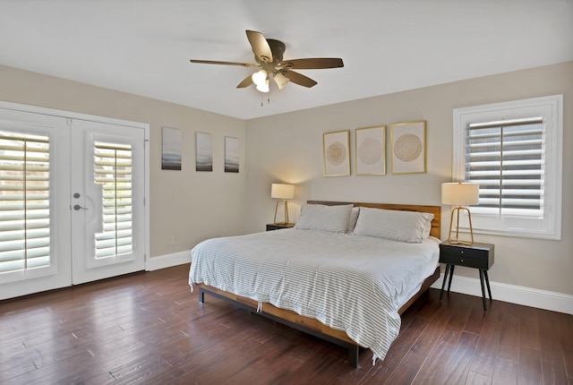 bedroom featuring french doors, baseboards, wood finished floors, and access to outside