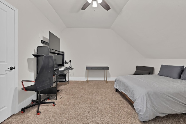 carpeted bedroom featuring ceiling fan, baseboards, and lofted ceiling