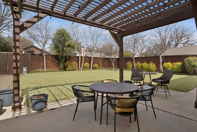 view of patio / terrace with outdoor dining space and a fenced backyard