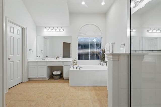 1161 Mission Ln, Lantana, TX 76226 - bathroom with double vanity, tile patterned flooring, and a bath