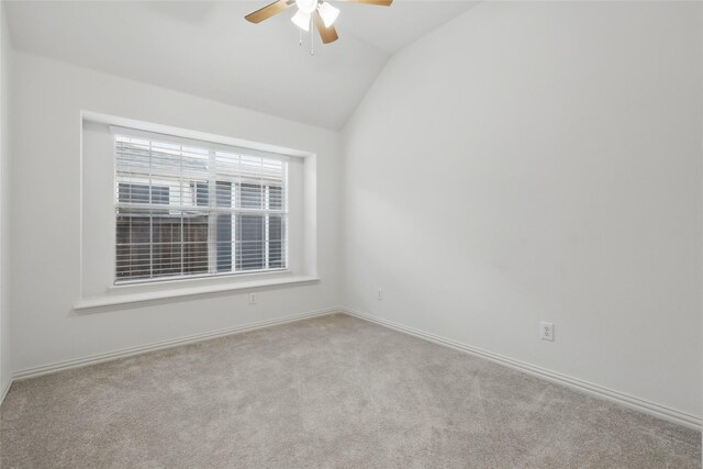 1161 Mission Ln, Lantana, TX 76226 - carpeted empty room with ceiling fan, vaulted ceiling, and baseboards