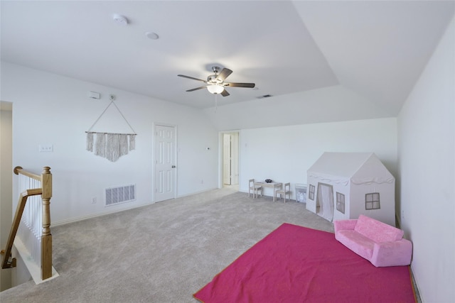 bedroom featuring visible vents, ceiling fan, lofted ceiling, and carpet