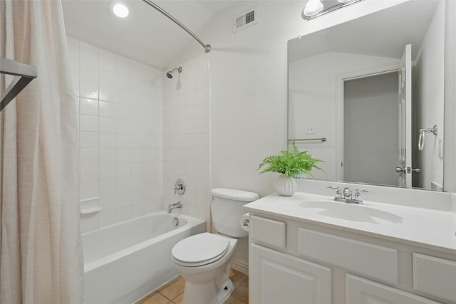 bathroom featuring tile patterned floors, visible vents, toilet, shower / bath combo, and vaulted ceiling