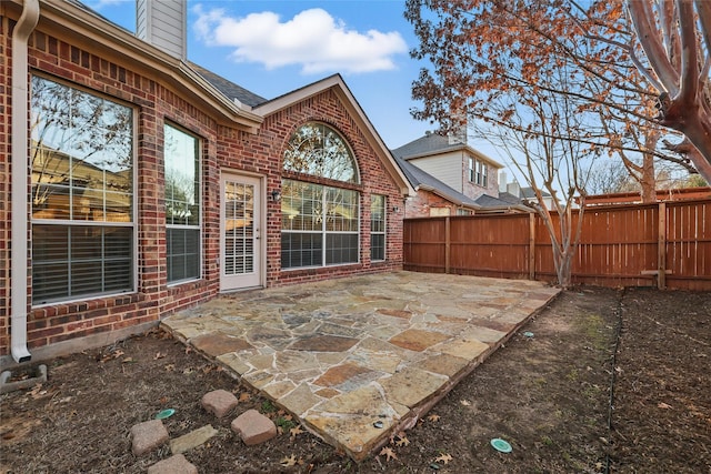 view of patio / terrace featuring fence