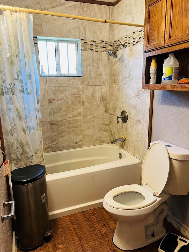 full bathroom featuring toilet, shower / bath combo with shower curtain, and wood finished floors