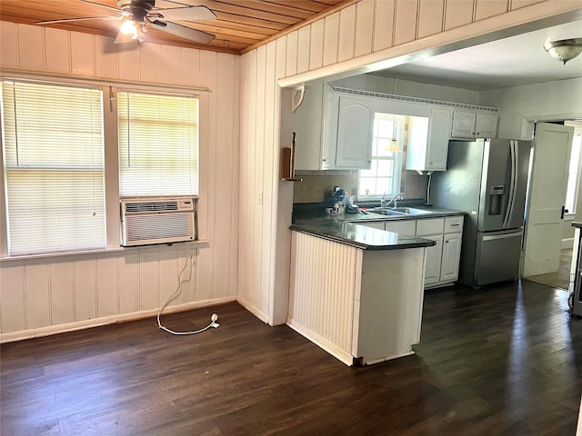 7155 Farm Rd Unit 1499, Sumner, TX 75486 - kitchen with dark countertops, cooling unit, dark wood-style flooring, a ceiling fan, and stainless steel fridge