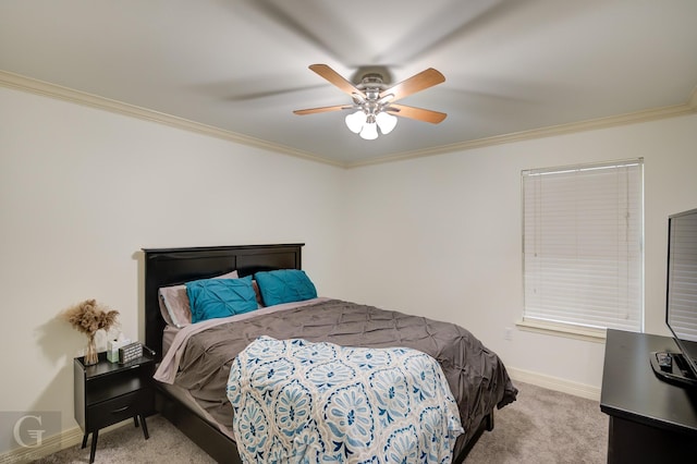 bedroom with ceiling fan, baseboards, carpet floors, and ornamental molding