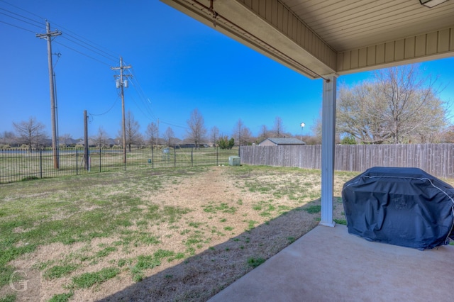 view of yard with a fenced backyard and a patio area