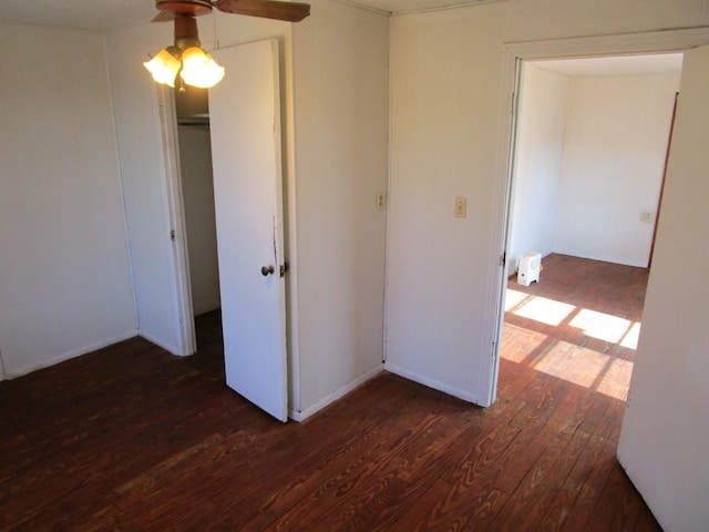 unfurnished bedroom with hardwood / wood-style flooring