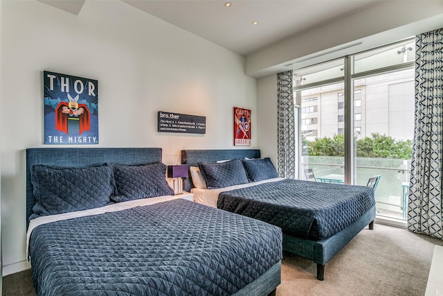 bedroom featuring recessed lighting, carpet, and access to exterior