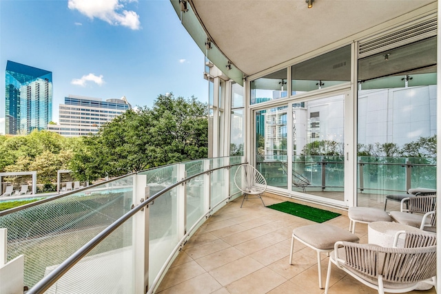 balcony featuring a city view