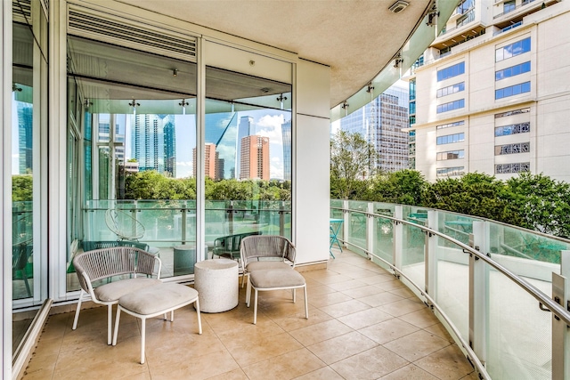 balcony featuring a city view