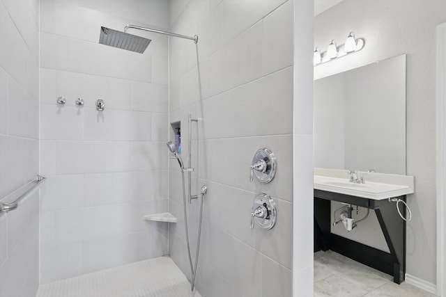 full bath featuring tiled shower