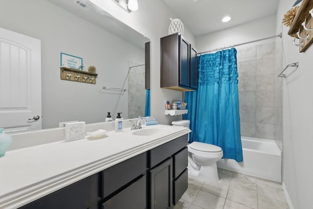 bathroom featuring visible vents, toilet, shower / tub combo with curtain, tile patterned floors, and vanity