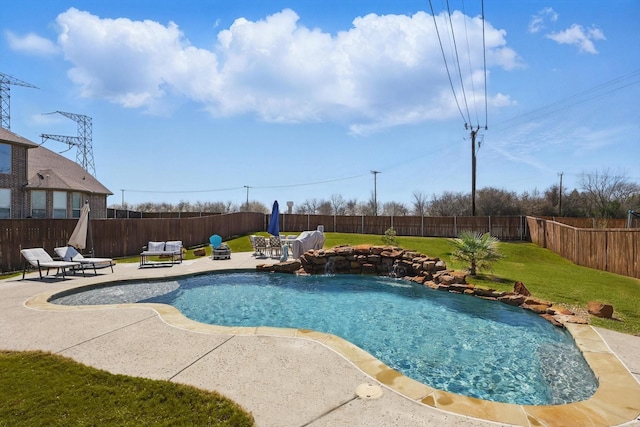 view of pool with a patio, a yard, a fenced backyard, and a fenced in pool