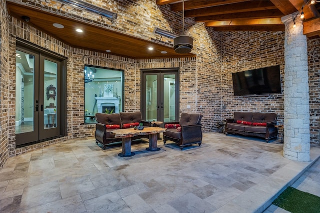 view of patio with french doors and outdoor lounge area