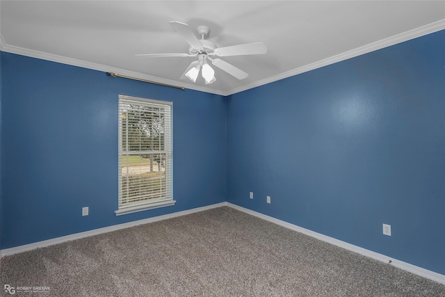 unfurnished room with baseboards, carpet floors, ceiling fan, and ornamental molding