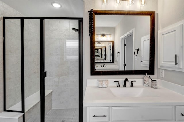 full bathroom with a stall shower and vanity