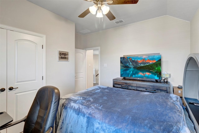 bedroom with visible vents, ceiling fan, and vaulted ceiling