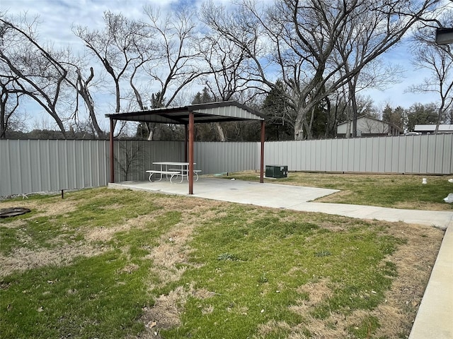 view of yard with a patio area and fence