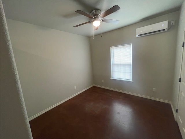 empty room with an AC wall unit, baseboards, and a ceiling fan