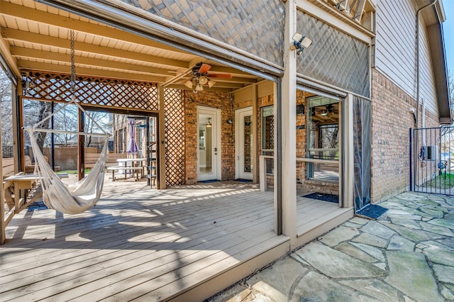 wooden deck with ceiling fan