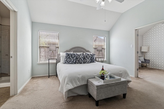 bedroom featuring baseboards, multiple windows, carpet, and lofted ceiling