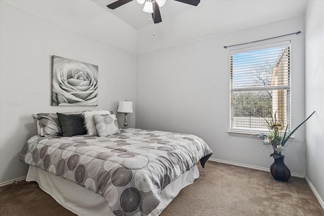 carpeted bedroom with a ceiling fan and baseboards