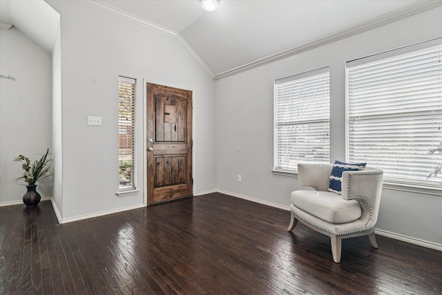 living area with vaulted ceiling, wood-type flooring, crown molding, and a wealth of natural light