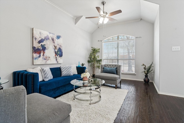 living area with ornamental molding, a ceiling fan, hardwood / wood-style floors, baseboards, and vaulted ceiling