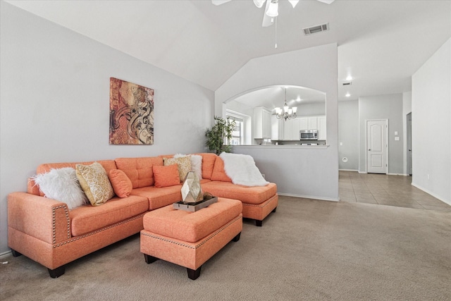 living area featuring visible vents, lofted ceiling, light carpet, ceiling fan with notable chandelier, and arched walkways