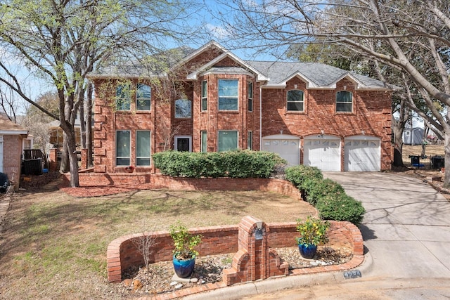 colonial inspired home with a front lawn, driveway, cooling unit, a garage, and brick siding