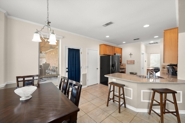 dining area featuring recessed lighting, visible vents, light tile patterned flooring, and crown molding