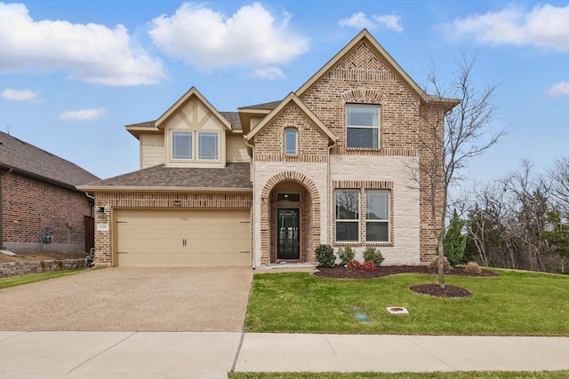 view of front of house featuring driveway, a front lawn, a shingled roof, a garage, and brick siding