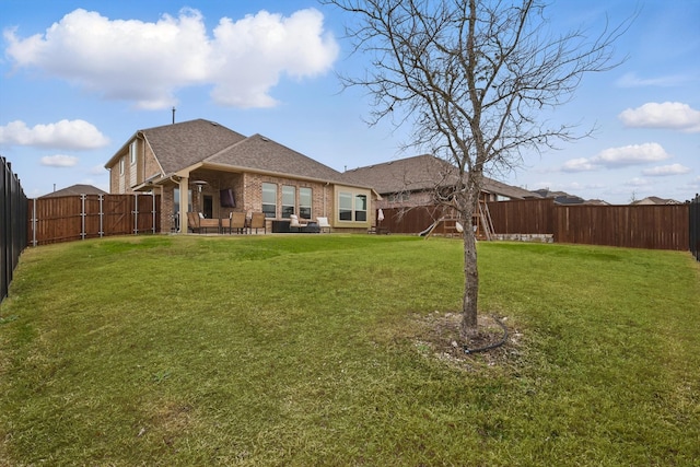 view of yard featuring a patio and a fenced backyard