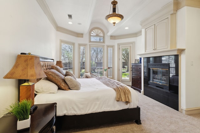 carpeted bedroom featuring visible vents, a tiled fireplace, beamed ceiling, ornamental molding, and recessed lighting