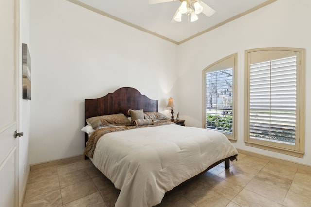 bedroom featuring ceiling fan, ornamental molding, and light tile patterned flooring