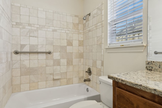 bathroom with shower / washtub combination, toilet, and vanity