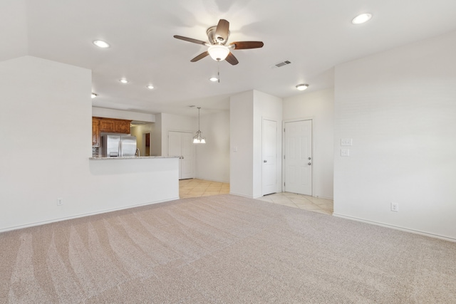 unfurnished living room with recessed lighting, light colored carpet, visible vents, and ceiling fan