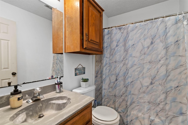 bathroom with a shower with shower curtain, a textured ceiling, toilet, and vanity