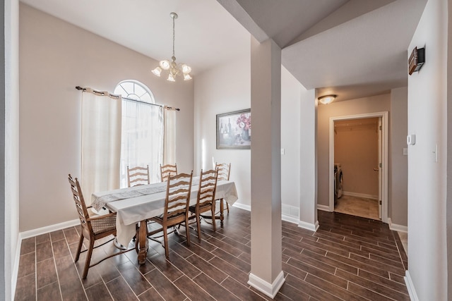 dining room with baseboards and wood tiled floor