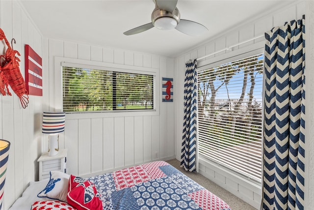 carpeted bedroom featuring a ceiling fan