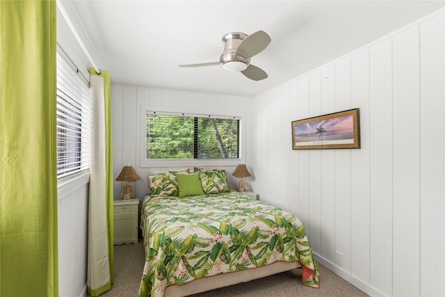 carpeted bedroom with a ceiling fan